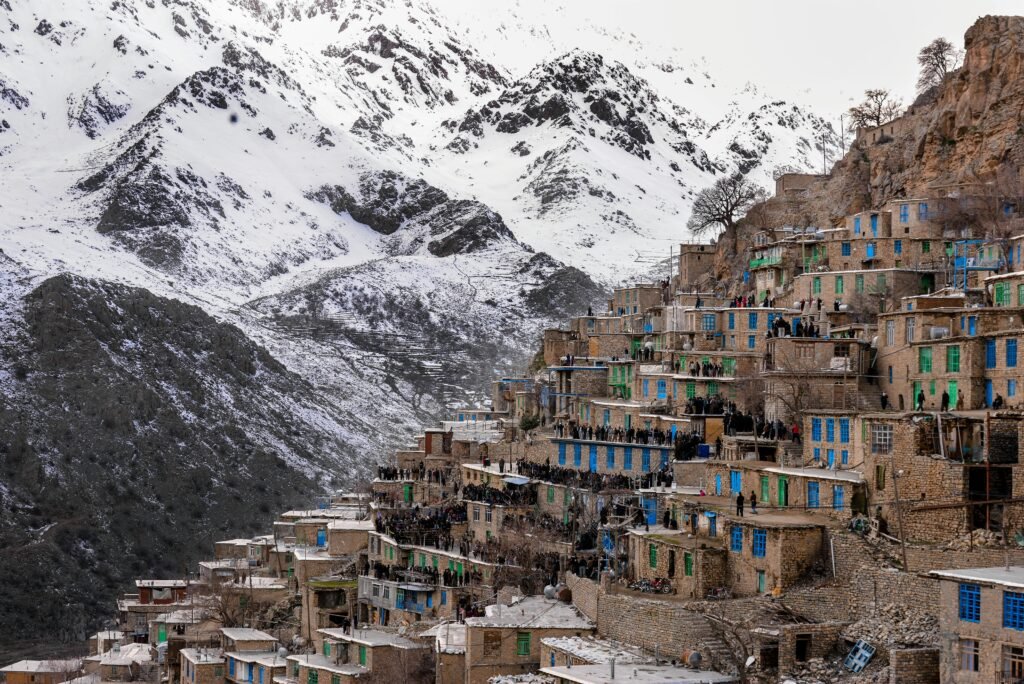 Breathtaking view of Palangan Village nestled in the snowy mountains of Kurdistan, Iran.